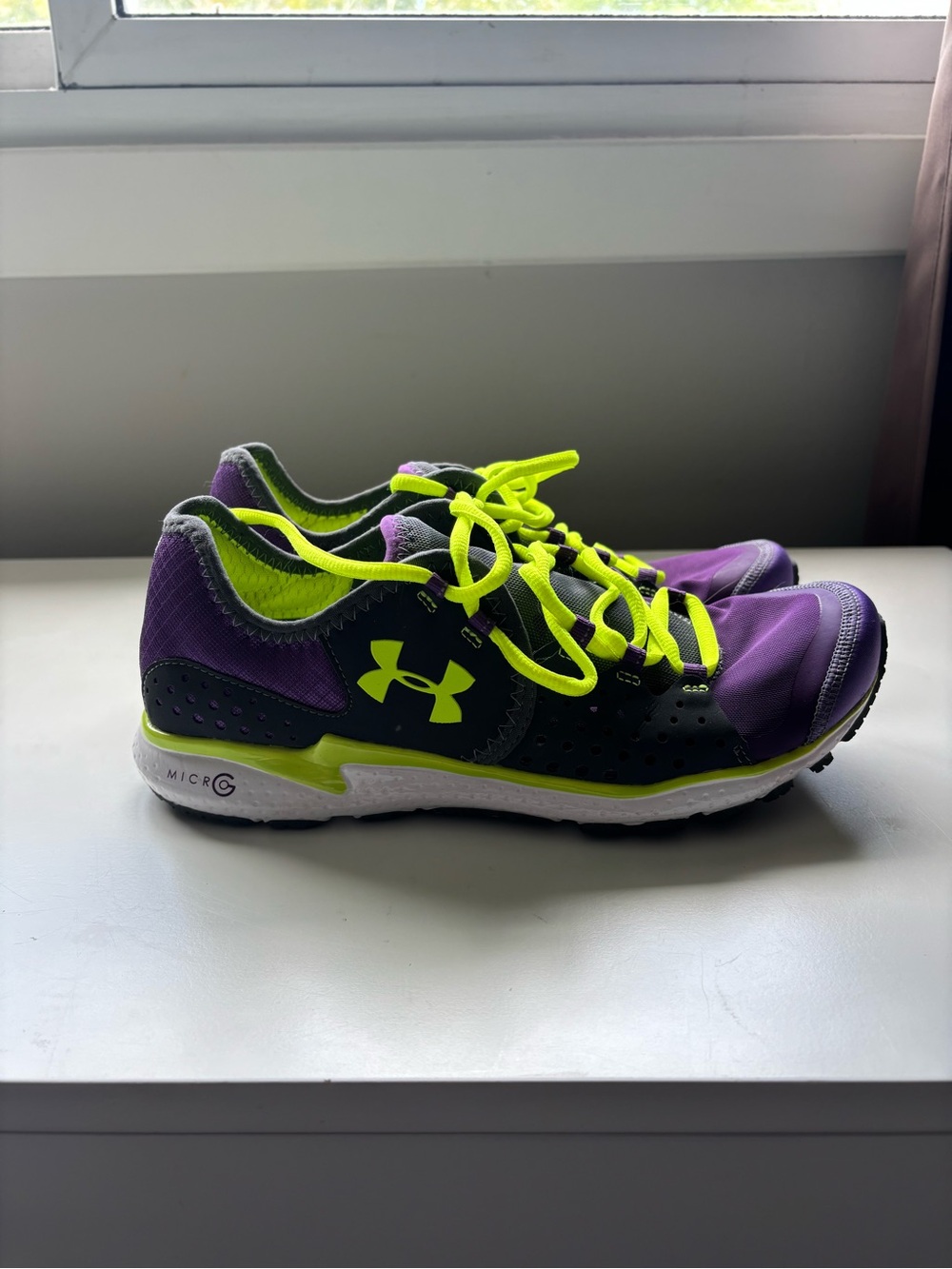 Under armour women’s purple and yellow charge RC 2 running shoes size 9